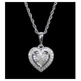 Sterling silver diamond cluster heart pendant with