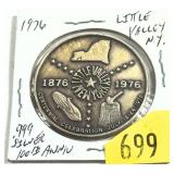 .999 Silver medal
