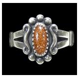 Sterling silver dentil set goldstone ring in
