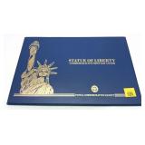 Statue of Liberty coin and stamp set