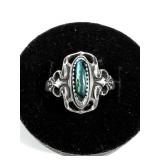 Sterling silver dentil set blue/green paua ring,
