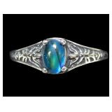 Sterling silver prong set blue paua ring, size 6