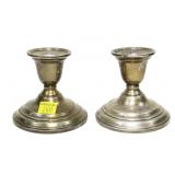 Pair of sterling silver weighted candlesticks,