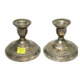 Pair of sterling silver weighted candlesticks,