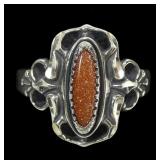 Sterling silver dentil set goldstone ring in