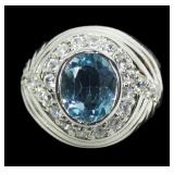 Sterling silver bezel set oval cut blue topaz ring
