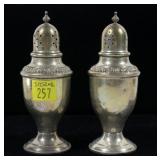 Pair of sterling silver salt and pepper shakers,