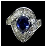 Sterling silver pear cut cultured blue sapphire