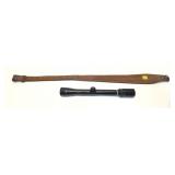 Lot: Revelation 4x Scope and leather sling