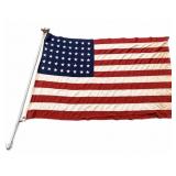 48-star American flag with eagle head pole