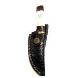 Custom Damascus blade knife with embossed