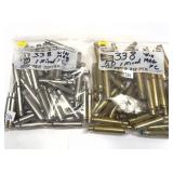 Lot: 2 bags of .338 Win Mag cases,