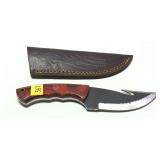 Custom hunting knife with gut hook in leather