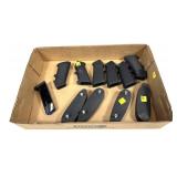 Lot: assorted pistol grips, 4 butt pads, and
