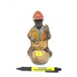 Boy on pot holding watermelon cast iron bank,