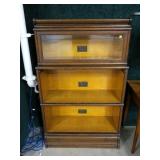 Macey oak sectional bookcase with one drawer