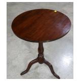 Round mahogany tilt-top candle stand,