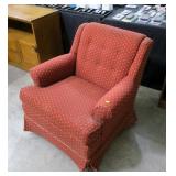 Upholstered swivel rocking chair
