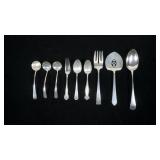9- Sterling flatware and serving pieces