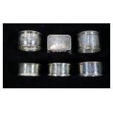 Lot, 5 napkin rings (4 marked sterling) and