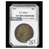 1887 Morgan dollar, PCI slab certified MS-65+