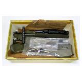 Box of cleaning kits and rods