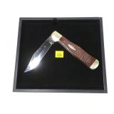 Case XX folding knife with rosewood handle,