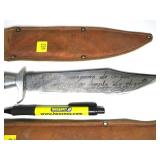 Lot, three vintage knives with leather sheaths