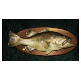 Trophy large mouth bass marked on board