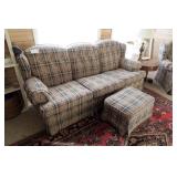 Upholstered sofa and matching arm chair