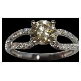 14K White gold 1.08 ct. round brilliant cut fancy
