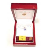 14K White gold round cut tanzanite pendant with