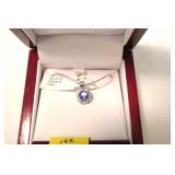 14K White gold round cut tanzanite pendant with