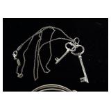 Sterling silver keys marked Tiffany & Co. 925 on