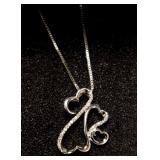 Sterling silver and diamond open  hearts pendant