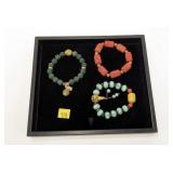 Lot, 3 bracelets: blue beaded, green beaded, red