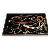 Lot, 3 necklaces and 2 bracelets; white necklace