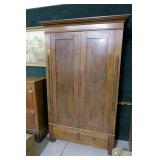 Oak two-door over two-drawer wardrobe