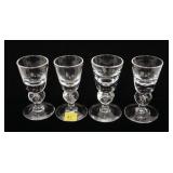 Set of four 3.75" Steuben cordials, signed