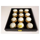 Set of 12 German gold porcelain salts