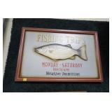 Framed fishing trips sign