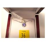 14K White gold tanzanite pendant, approx. 0.80 ct.