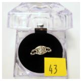 Sterling silver diamond knot style ring