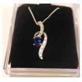 Sterling silver blue and white sapphire pendant on