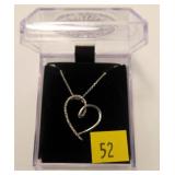 Sterling silver heart shaped pendant with diamond