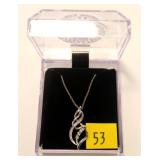 Sterling silver swirl style pendant with diamond