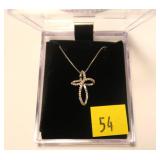 Sterling silver cross pendant with diamond accents