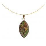 14K Yellow gold bezel set cabochon cut ammolite