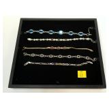 5- Sterling silver bracelets, four have gemstones