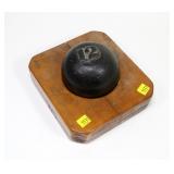 #12 Cannon ball on wooden platform